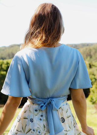 The Flora Wrap Blouse Sky Blue